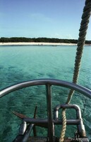 View of deserted beach from the sailboat