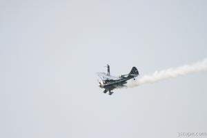 Jimmy Franklin's jet/prop 1936 Turbo-Waco with a wing walker
