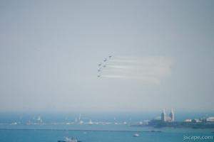 USAF F-16 Thunderbirds in Delta formation over Chicago's lakefront