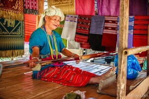 Karen tribe woman making a silk scarf