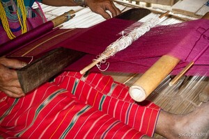 Karen tribe woman making a silk scarf