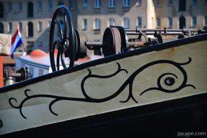 Ship hull art and what may be the anchor hoist