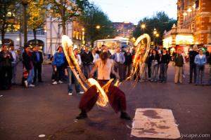 Previous: Street performer showing off fire ropes
