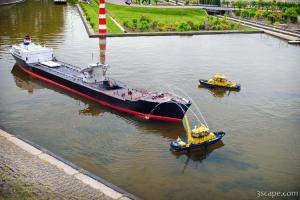 Model oil barge on fire