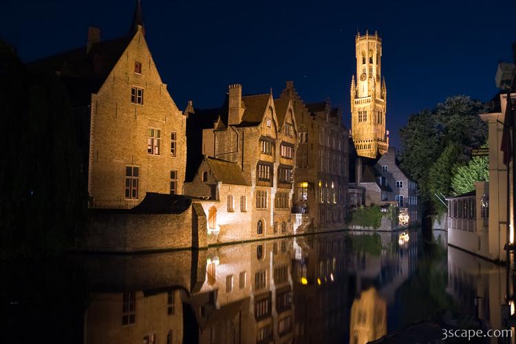 Medieval buildings and Belfry reflecting in the River Dijver