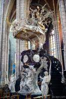 Next: Ornately crafted wood and marble pulpit