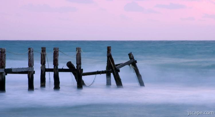 Morning waves at the destroyed dock