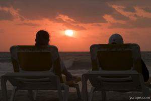 People watching the sunrise on the beach