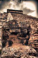 Serpent head at the base of El Castillo