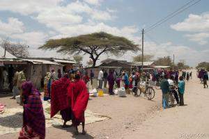 Maasai people and locals in a small town near Arusha
