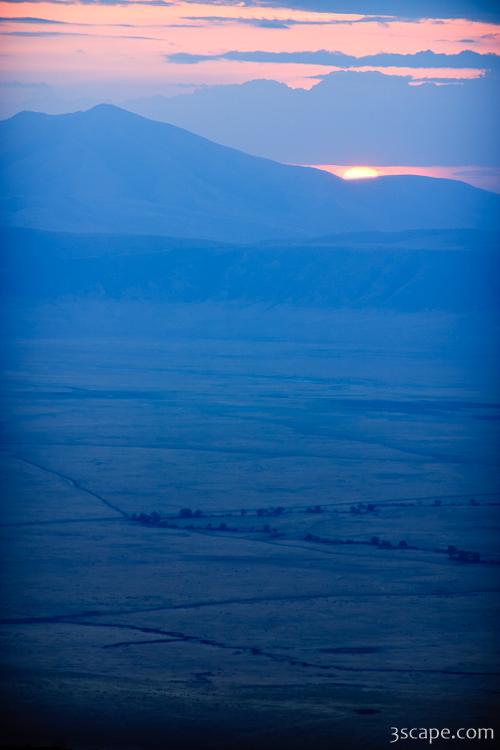 Sunset barely illuminating the crater floor, 2000 feet below our lodge