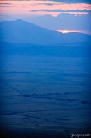 Sunset barely illuminating the crater floor, 2000 feet below our lodge