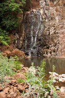 Waterfall at the end of our hike through banana groves