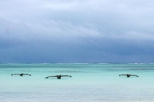 Boats and an approaching storm