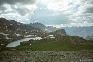 Panoramic of high mountain lakes, and a deep gorge beyond