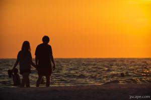 Couple taking a romantic walk on the beach