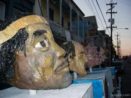 Giant heads waiting for the parade