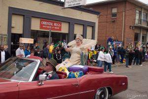 Krewe of Iris Queen in an old caddy