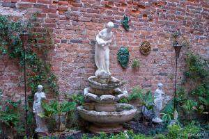 Fountain and sculptures tucked away in an alley