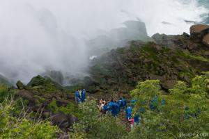 Tourists going down stairs to Cave of the Winds