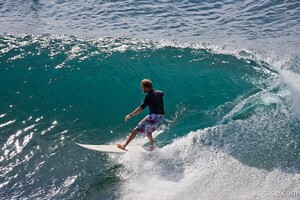 Surfer taking a wave near Honolua