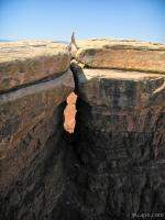 Falke traversing rock columns at White Crack