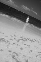 Woman wading in the water