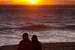 Next Image: Two people enjoying the sunset at Tree at sunset, Leo Carrillo State Beach