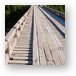 Small wooden bridge over Riviere Hart Jaune Metal Print