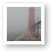 Lighthouse in thick Lake Michigan fog Art Print