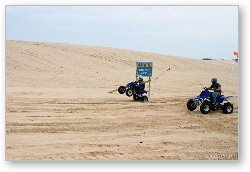 License: Quad ATV riding in dunes
