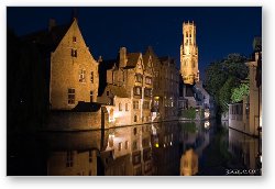 License: Medieval buildings and Belfry reflecting in the River Dijver