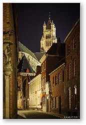 License: Narrow illuminated street and St Saviour Cathedral