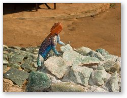 License: Colorful male Agama lizard perked up to look intimidating