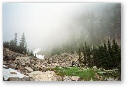 License: Hikers walking off into the mountain fog