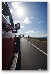 License: Bicycle rider on Maui highway