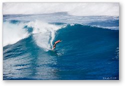 License: Surfer cutting a wave on Maui's north shore - Hookipa