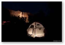 License: Night shot of camp site with illuminated canyon walls