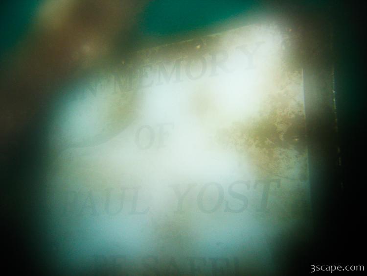 One of many memorial plaques left for divers who have died here (my lens was fogged)