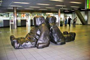 Metal sack-man art at Schiphol Airport