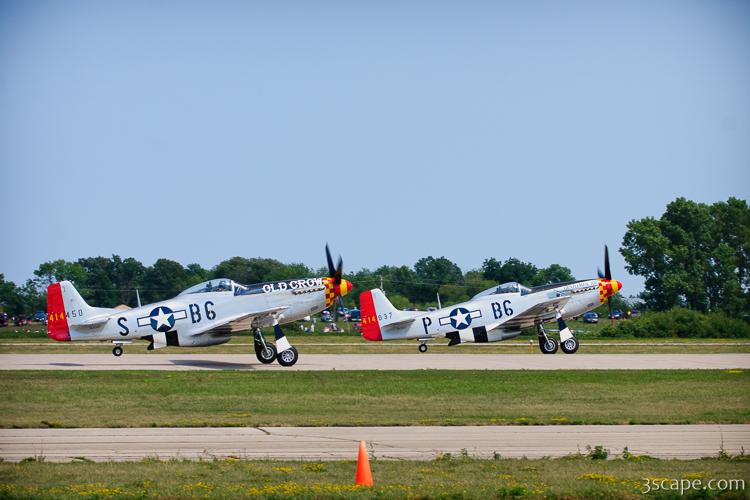 P-51D Mustangs 'Old Crow' and 'Gentleman Jim' on formation take-off
