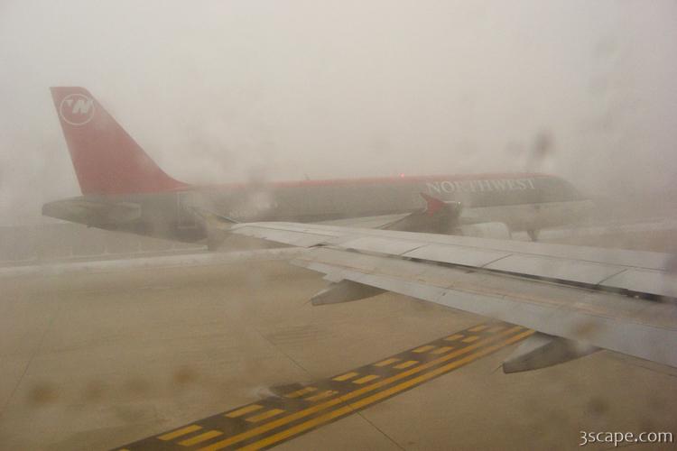Thick fog at the airport delayed our flight two hours