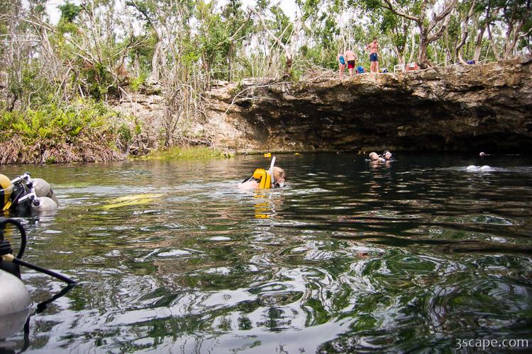 Swimmers and divers at Garden of Eden Cenote