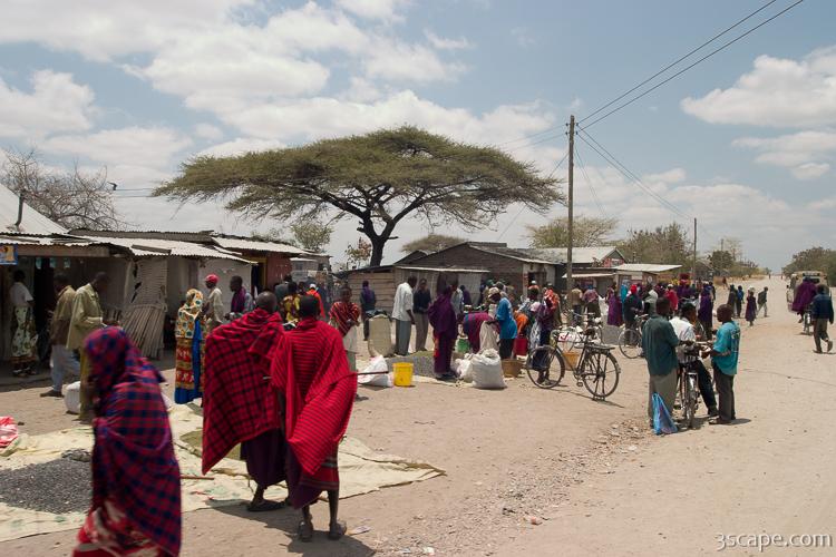 Maasai people and locals in a small town near Arusha