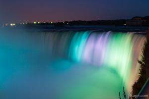 Colorful lights illuminating Niagara Falls