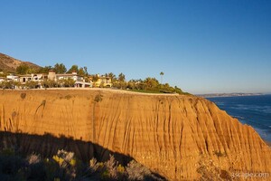 Big homes on bluffs on the Pacific coast
