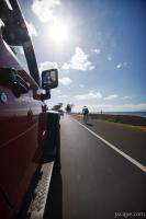 Bicycle rider on Maui highway