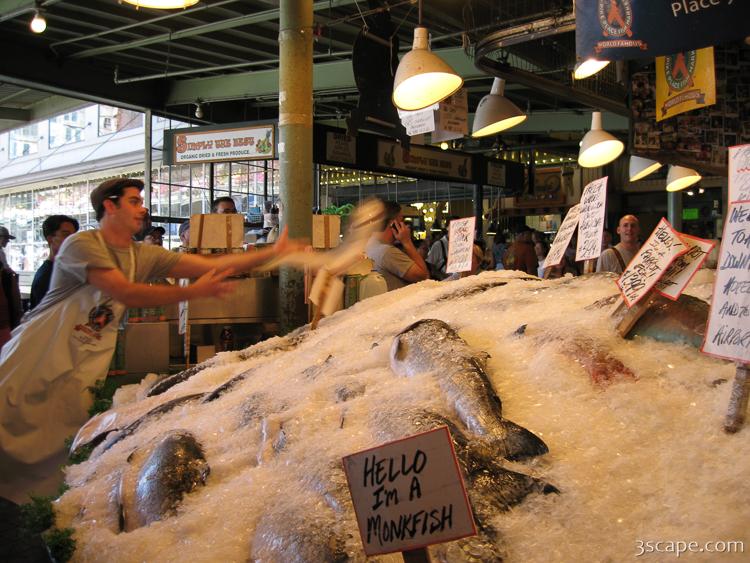Fish throwing at Pike Place Fish Market Photograph by Adam Romanowicz