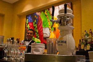 Bartender and fresh Corona on tap