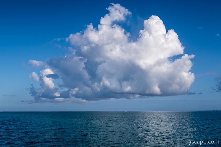 Giant Puffy Cloud over the Sea Photograph by Adam Romanowicz